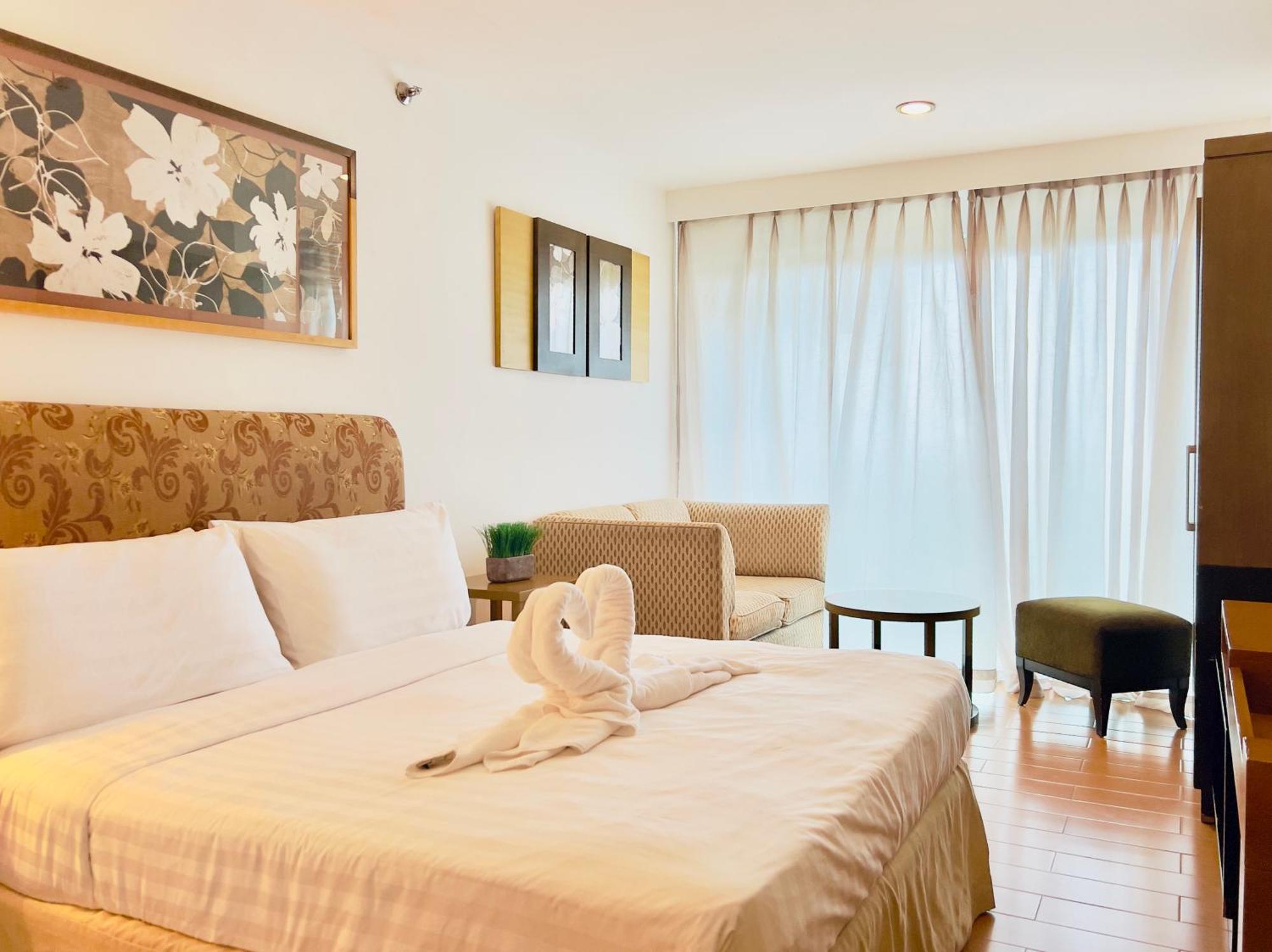 One Tagaytay Place Hotel Suites Official Account Тагайтай Экстерьер фото