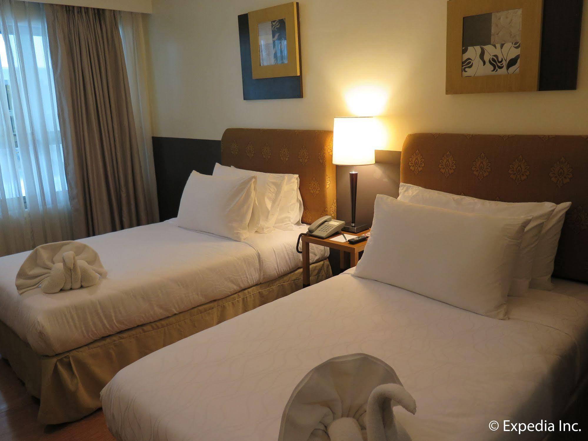 One Tagaytay Place Hotel Suites Official Account Тагайтай Экстерьер фото